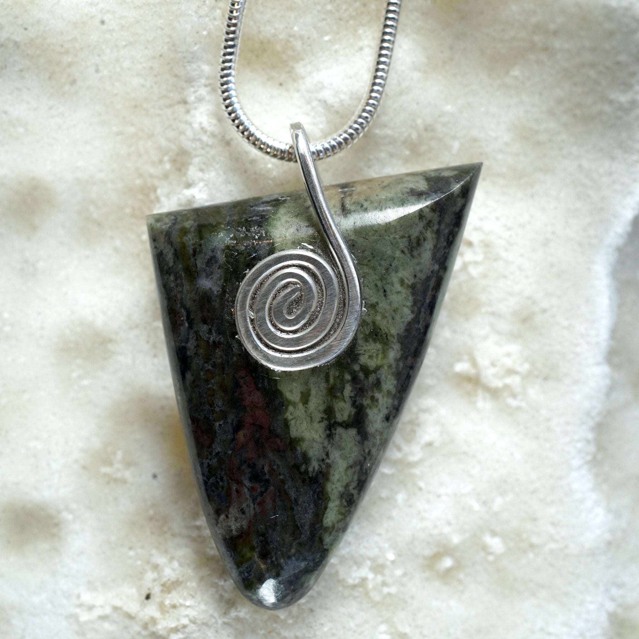 Connemara Marble Triangle Pendant with a Sterling Silver Celtic Spiral from Angela Kelly Jewellery Enniskillen Fermanagh