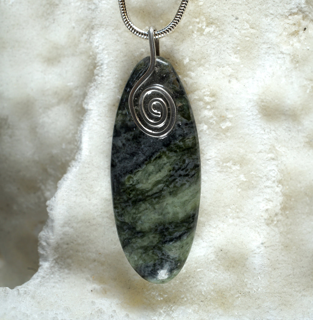 CM08P Connemara Marble Oval Pendant with a Sterling Silver Celtic Spiral from Angela Kelly Jewellery Enniskillen Fermanagh