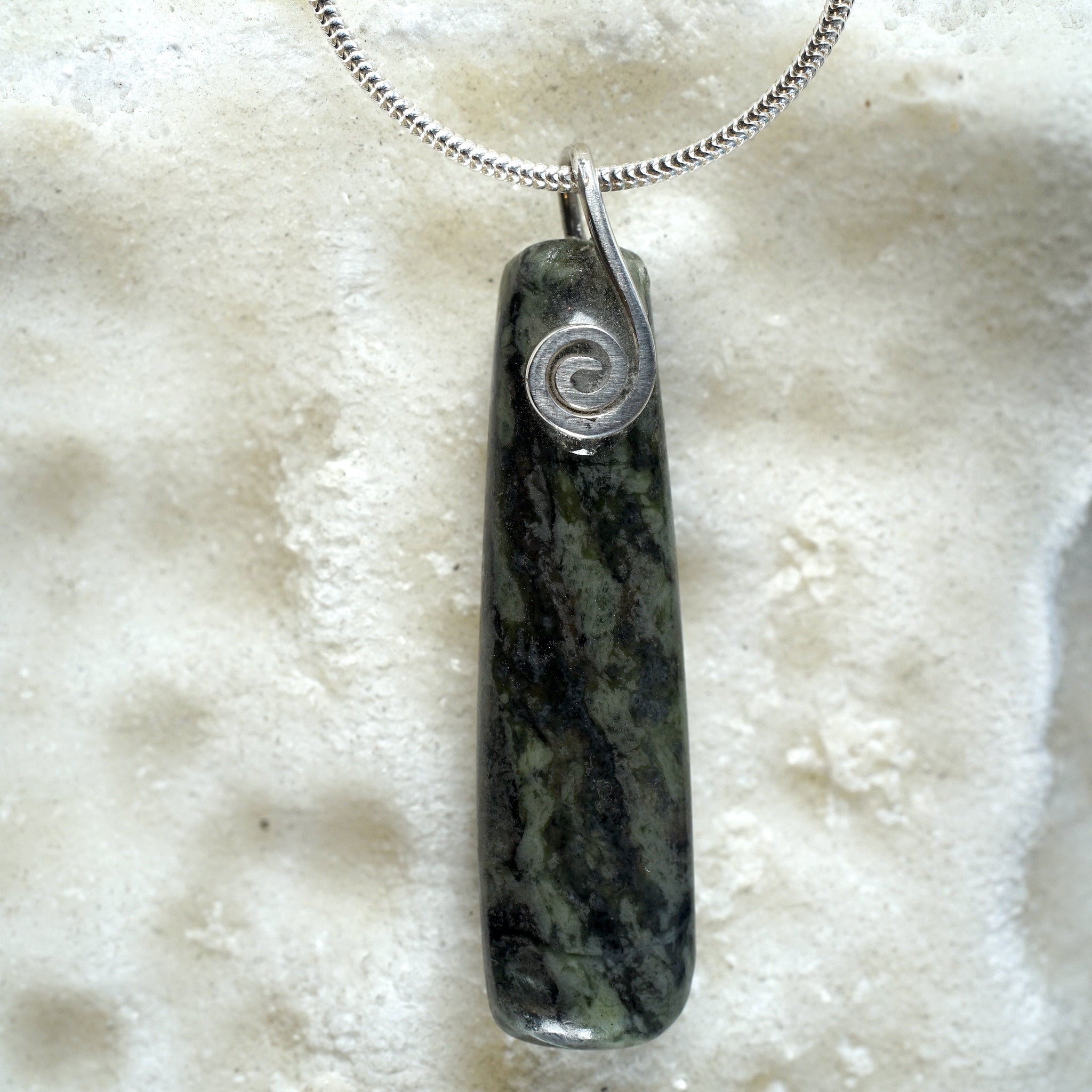 Connemara Marble Narrow rectangle pendant with a sterling silver celtic spiral from Angela Kelly Jewellery Enniskillen Fermanagh