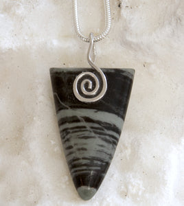 MMBS05P Mourne Mountain banded stone triangle pendant with a sterling silver Celtic spiral from Angela Kelly Jewellery Enniskillen Fermanagh