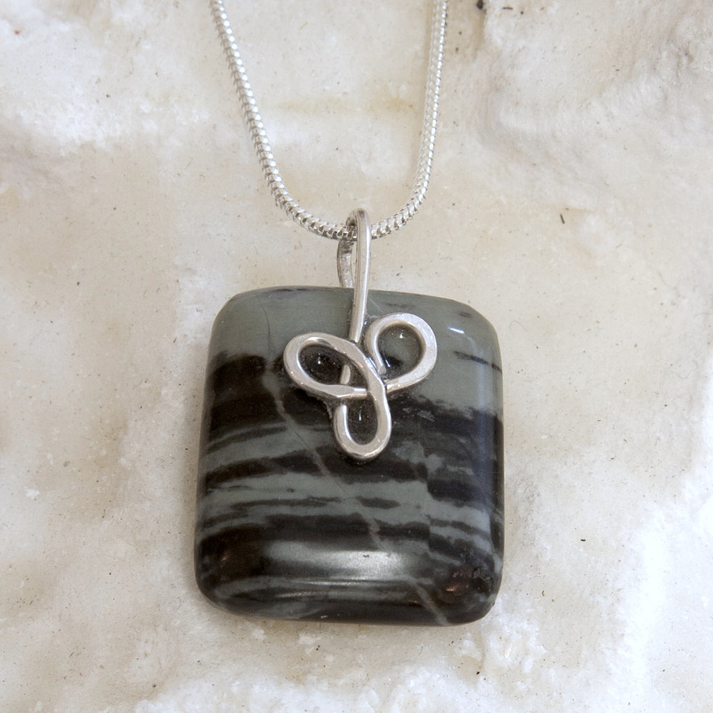 MMB29P Mourne Mountain banded stone square pendant with sterling silver trinity knot from Angela Kelly Jewellery Enniskillen Fermanagh