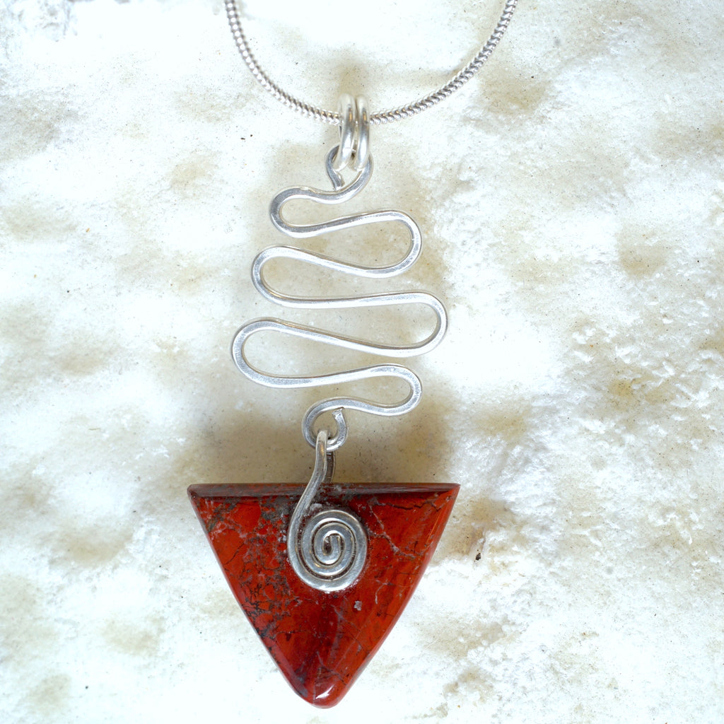 RJ09P Red Jasper Celtic triangle pendant with wavy silver wire detail from Angela Kelly Jewellery Enniskillen Fermanagh