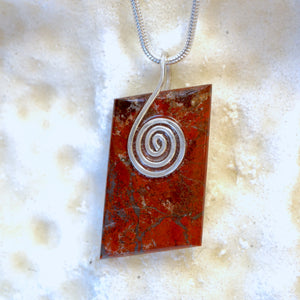 RJ12P Red Jasper Rectangle Pendant with a Sterling Silver Celtic Spiral